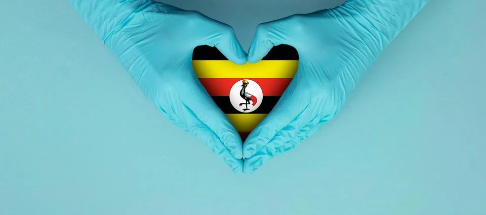 Doctors hands wearing blue surgical gloves making hear shape symbol with uganda Stock Illustration