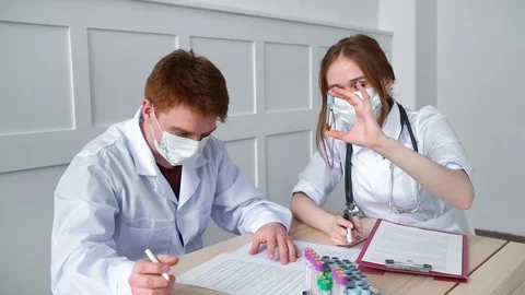 The doctors laboratory study of the blood of the sick with coronavirus. Stock Footage 128997139