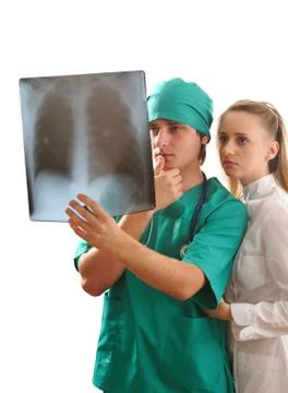 Doctors looking at x-ray Stock Photos