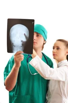 Doctors looking at x-ray Stock Photos