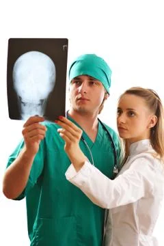 Doctors looking at x-ray Stock Photos