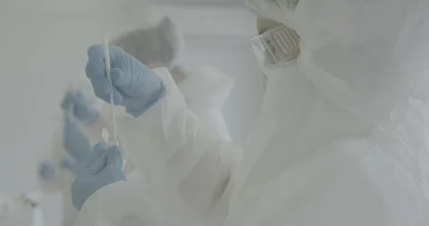 Doctors in mask and gloves at work Stock Footage 287987579