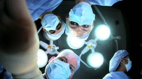 Doctors Nurses in Hospital Operating Room Faces Hands Stock Footage