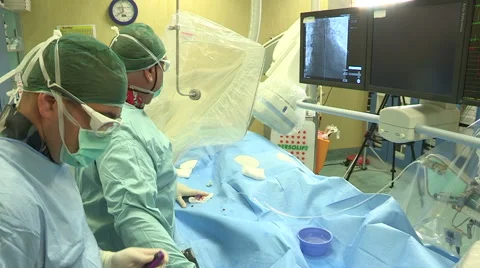 Doctors operating patient Stock Footage 45900855