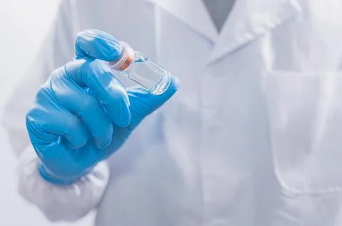 Doctors or scientists are using vaccines to fight COVID-19 or believe other.. Stock Photos