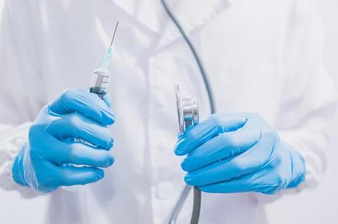 Doctors or scientists are using vaccines to fight COVID-19 or believe other.. Stock Photos