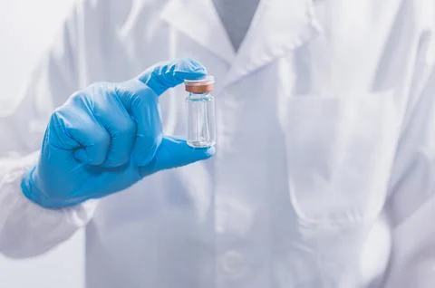 Doctors or scientists are using vaccines to fight COVID-19 or believe other.. Stock Photos