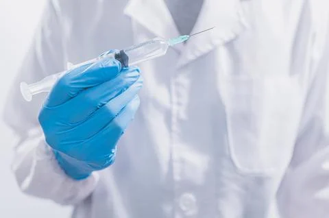Doctors or scientists are using vaccines to fight COVID-19 or believe other.. Stock Photos