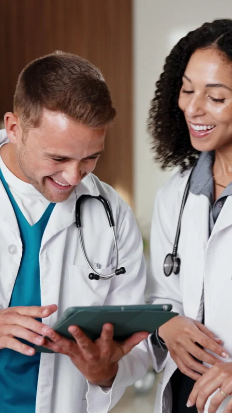 Doctors, people and high five with tablet in clinic for research, digital app or Stock Footage 341476453