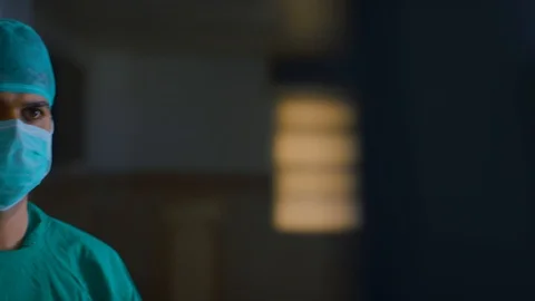 Doctors performing surgery Stock Footage 105819975