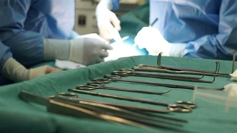Doctors Performing Surgery in Operating Room. Stock Footage 91818224