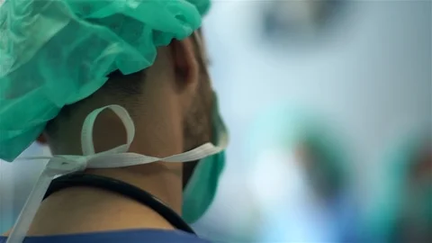 Doctors Performing Surgery in Operating Room. Stock Footage 92124921