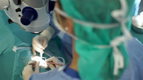 Doctors Performing Surgery in Operating Room. Stock Footage 92158454