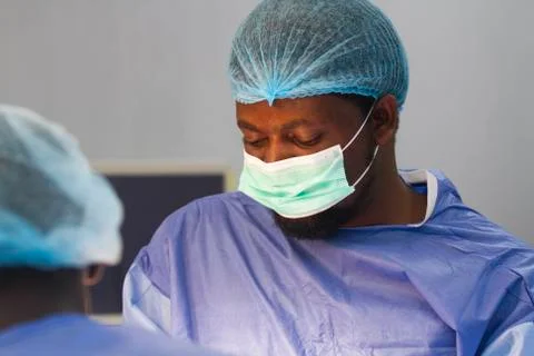 Doctors performing Surgery Stock Photos