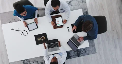 Doctors, planning and people with tech, boardroom and budget for new medical Stock Footage 321327279