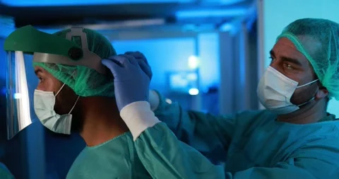 Doctors preparing to work inside hospital during coronavirus outbreak Stock Footage 149117038