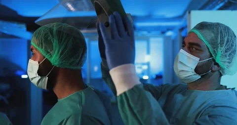 Doctors preparing to work inside hospital Stock Footage 149117053