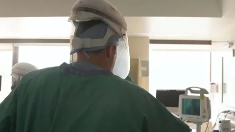 Doctors in protective suits. Work days. Pandemic covid-19 Stock Footage 143161259