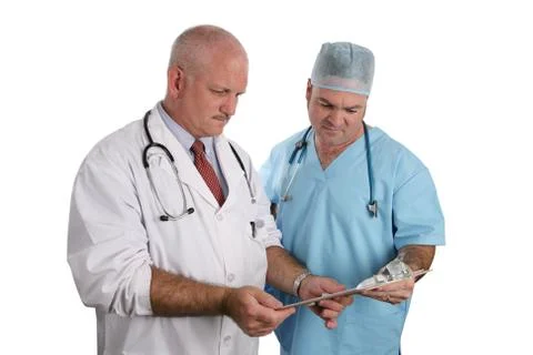 Doctors Review a Chart Stock Photos