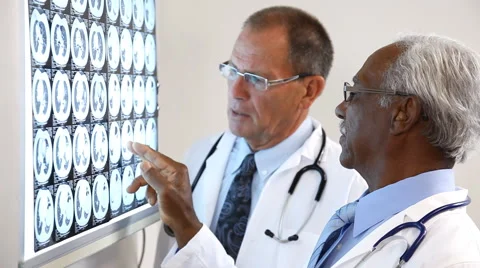 Doctors Reviewing Test Result Stock Footage 43358512