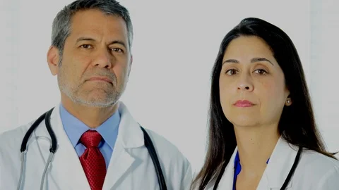 Doctors show a tablet with 5 things to do to avoid getting Covid-19 coronavirus. Video stock 127127427