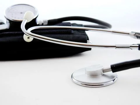 A doctor's stethoscope on a white background. Stock Photos