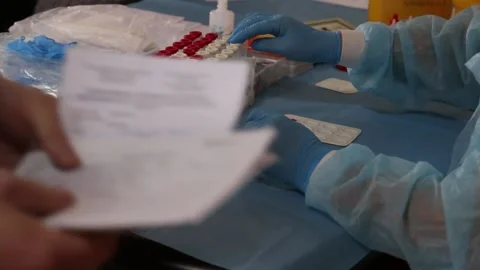 Doctors take tests Stock Footage 230142829