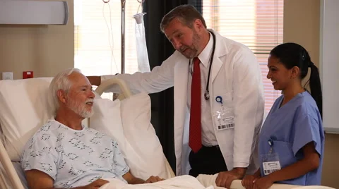 Doctors talking to patient Stock Footage 62281081
