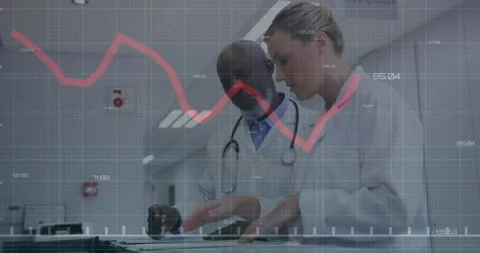 Doctors tapping desk at nursing station and adjusting graph for patient data Stock Footage 310972716