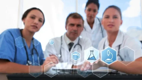 Doctors team using digital interface screen Stock Footage 73897198