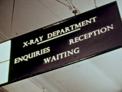 Doctors transporting a kid to check on him, Scotland, United kingdom, uk, 1948 Video stock 134036177