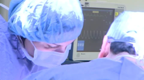 Doctors treating patient Stock Footage 43052806