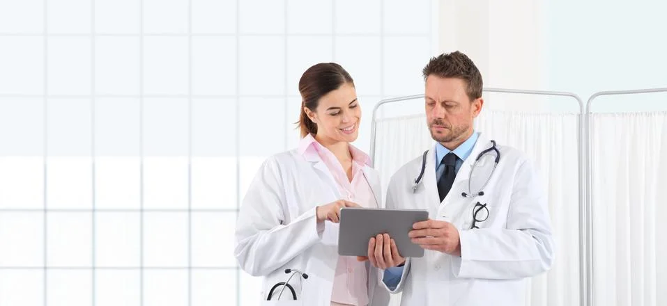 Doctors use the digital tablet, concept of medical consulting Stock Photos
