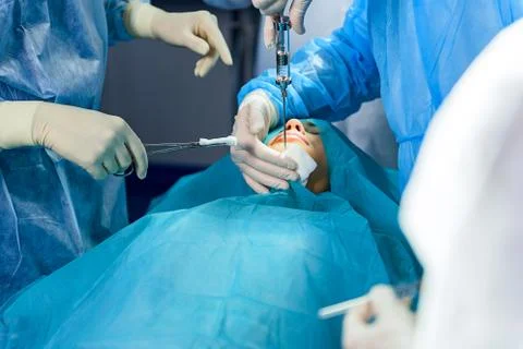 Doctors using different sterile tools Foto stock