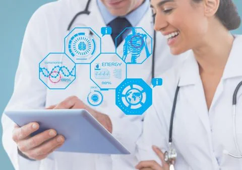 Doctors using digital tablet with multiple models interface in clinic Stock Photos