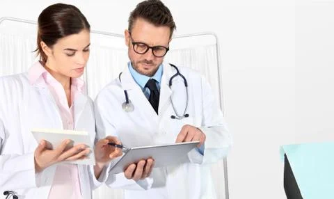 Doctors using a tablet, concept of medical consulting Stock Photos