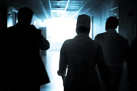 Doctors walking down the hall to save a life Foto stock