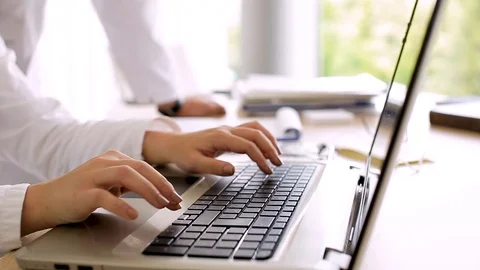 Doctors Working On Laptop Stock Footage 88322720