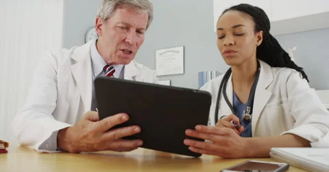 Doctors working in the office together Video stock 58352206