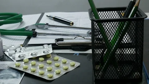 Doctor's working table in a modern hospital Stock Footage 87356086