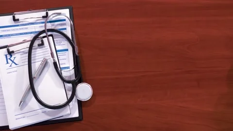 Doctor's workplace with a clipboard 库存影片 181062972