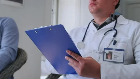 Doctors writing notes during medical training Stock Footage 316911702