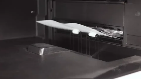 Document A4 comes out of the printer after printing Stock Footage 294628128