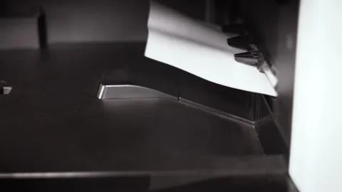 Document A4 comes out of the printer after printing Stock Footage 294628152