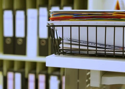 Document in basket at office Stock Photos