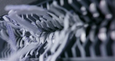Document being shredded view from side of jaws ripping paper Stock Footage 123730953