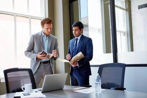 Document, business men and notebook in meeting for project workflow, financ.. Foto stock