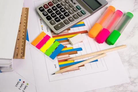 Document color graph sheet for presentation on room table at the office wit.. Stock-Fotos
