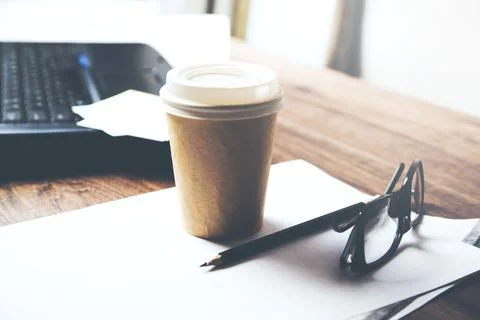 Document with cup of coffee and computer Stock Photos