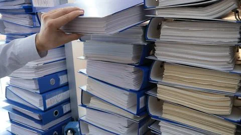 Document folder. Folders full of documents. Stock Photos